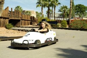 girl riding in go kart