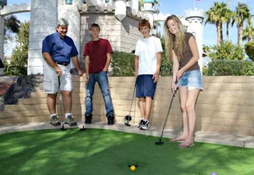 family playing goofy golf