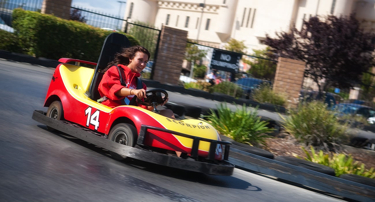 fun in race car at Golfland